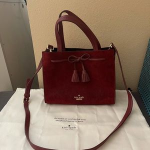 Kate Spade burgundy purse.